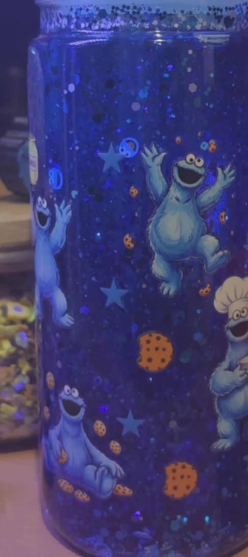 Premade 20oz acrylic snowglobe with cookie and a straw topper